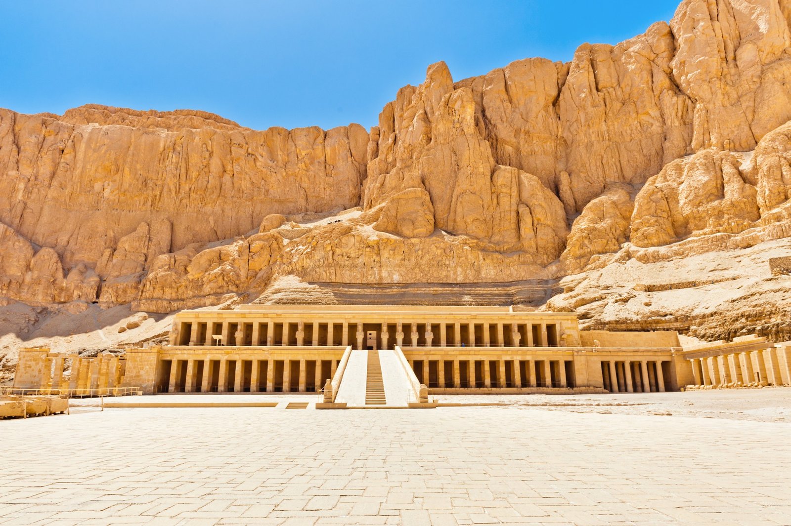 The terraced colonnades and central ramp of the Temple of Hatshepsut beneath the cliffs at Deir el-Bahari